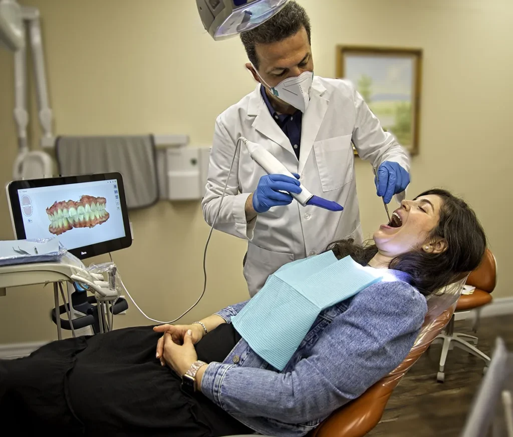 Dr. Vahan Placing Dental Crown