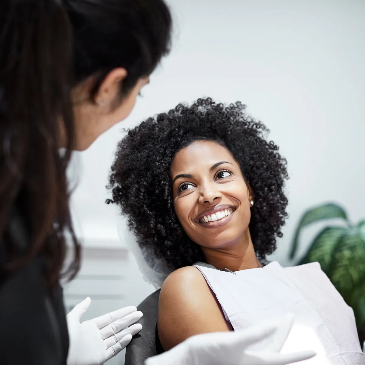 Happy Patient In Dental Chair
