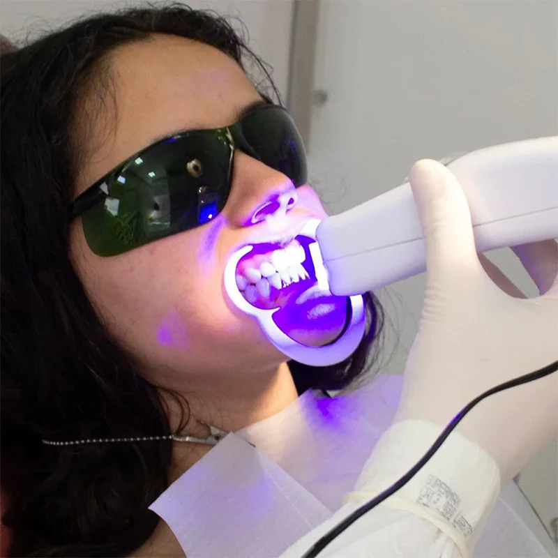 Patient Sitting Through Zoom Teeth Whitening Procedure
