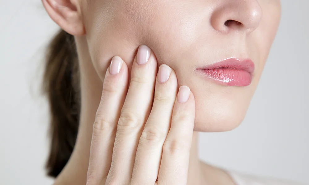 Woman With Jaw Pain